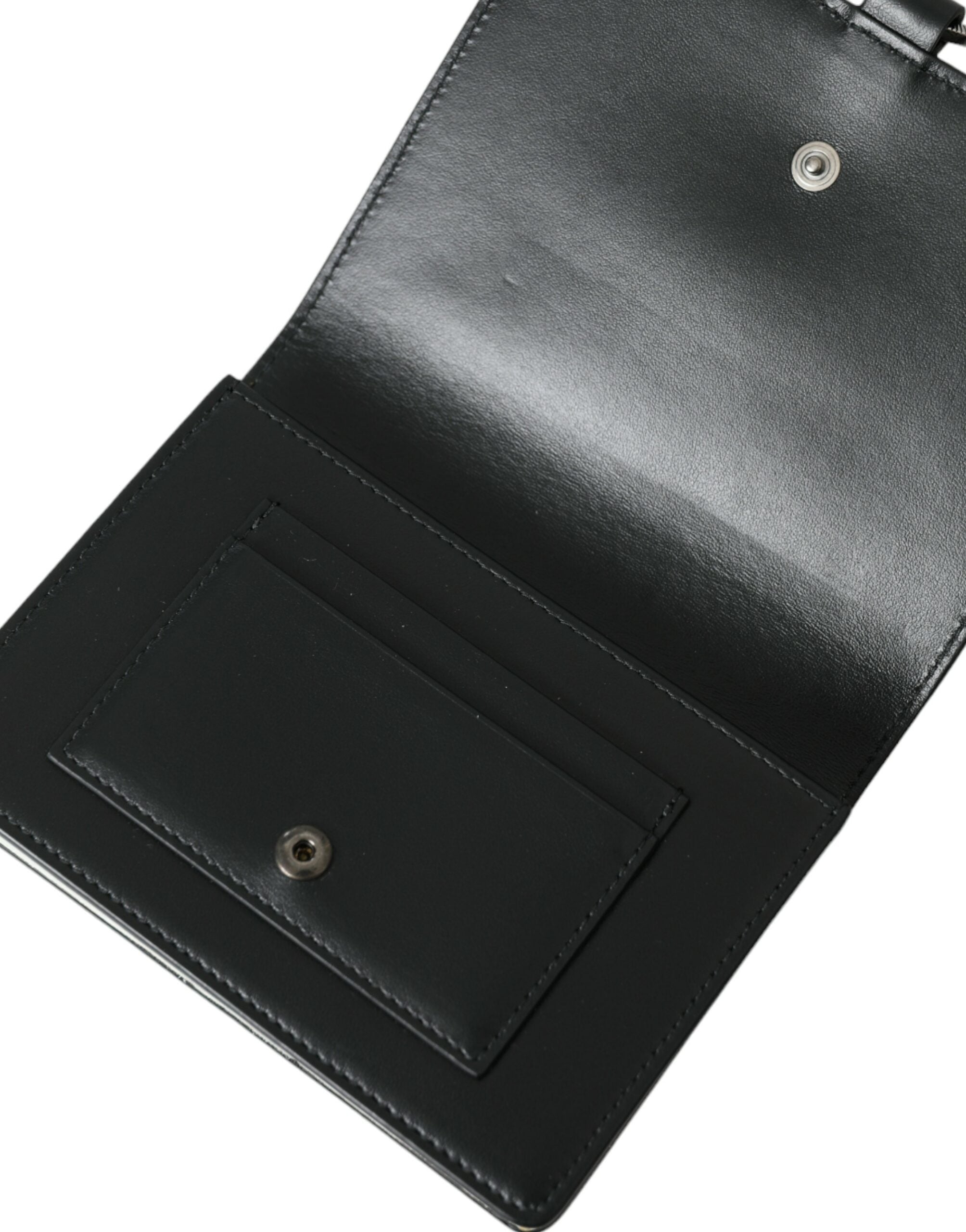 Dolce & Gabbana black and white leather cardholder wallet with crystal embellishments and sleek design.