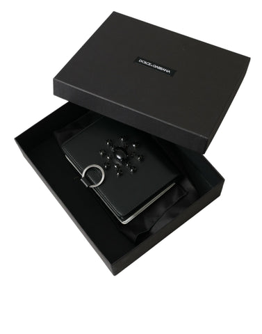 Black and white leather cardholder wallet with crystal embellishments from Dolce & Gabbana, featuring multiple card slots and a sleek design.