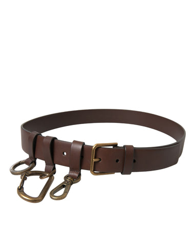 Brown calf leather belt with gold metal buckle from Dolce & Gabbana, featuring smooth leather and elegant hardware.