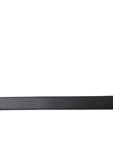 Black goat leather belt with antique metal buckle by Dolce & Gabbana, featuring a sleek design and adjustable strap.