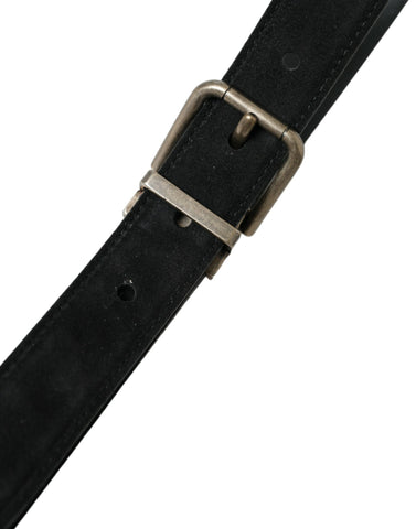 Black goat leather belt with antique metal buckle by Dolce & Gabbana, showcasing a sleek, stylish accessory.