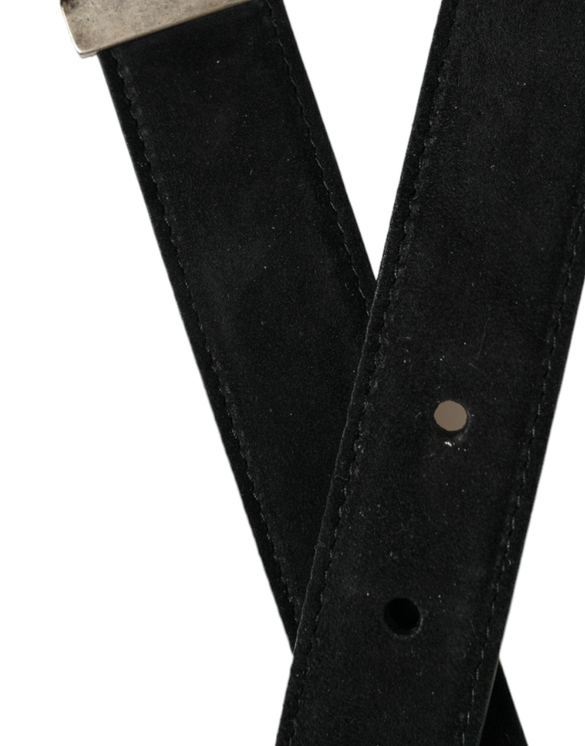 Black goat leather belt with antique metal buckle from Dolce & Gabbana, showing detailed leather texture and classic buckle design.