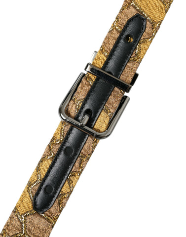 Gold leather jacquard Dolce & Gabbana belt with silver metal buckle, featuring intricate woven pattern and stylish design.