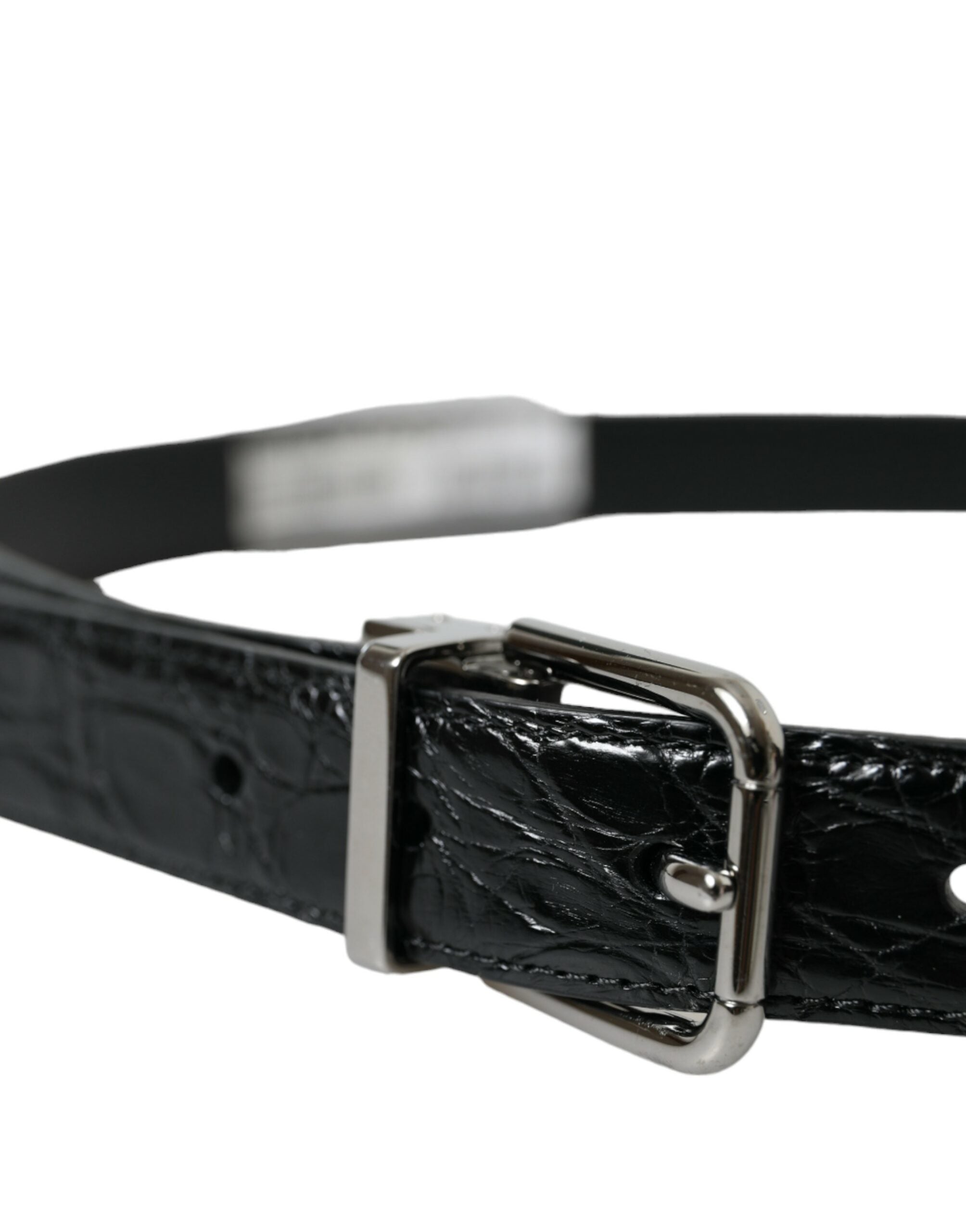 Black leather belt with silver metal buckle from Dolce & Gabbana, featuring a sleek and stylish design.