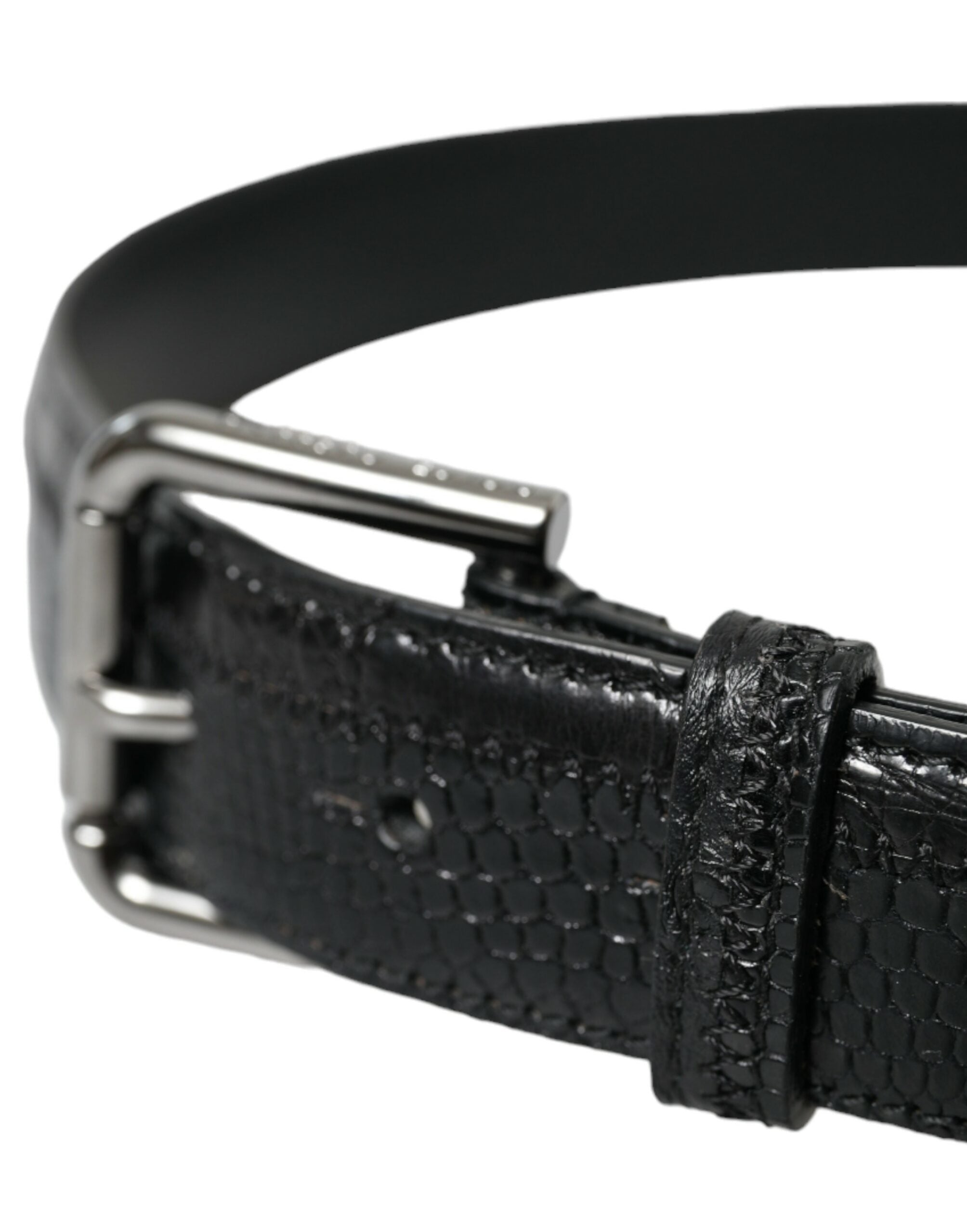 Black exotic leather belt with silver metal buckle from Dolce & Gabbana, featuring textured leather and sleek buckle detail.
