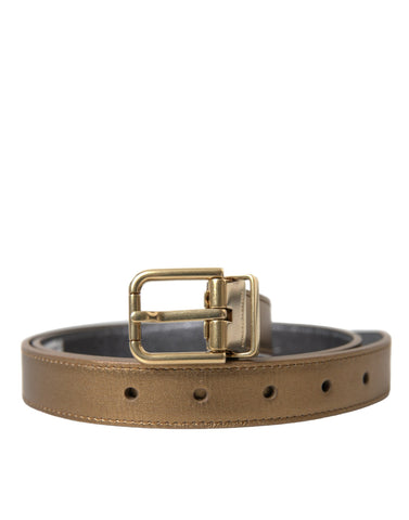 Gold metallic calf leather belt with a metal buckle from Dolce & Gabbana, featuring a sleek and stylish design.