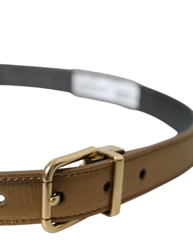 Gold metallic calf leather belt with a metal buckle from Dolce & Gabbana, showcasing a sleek and stylish accessory.