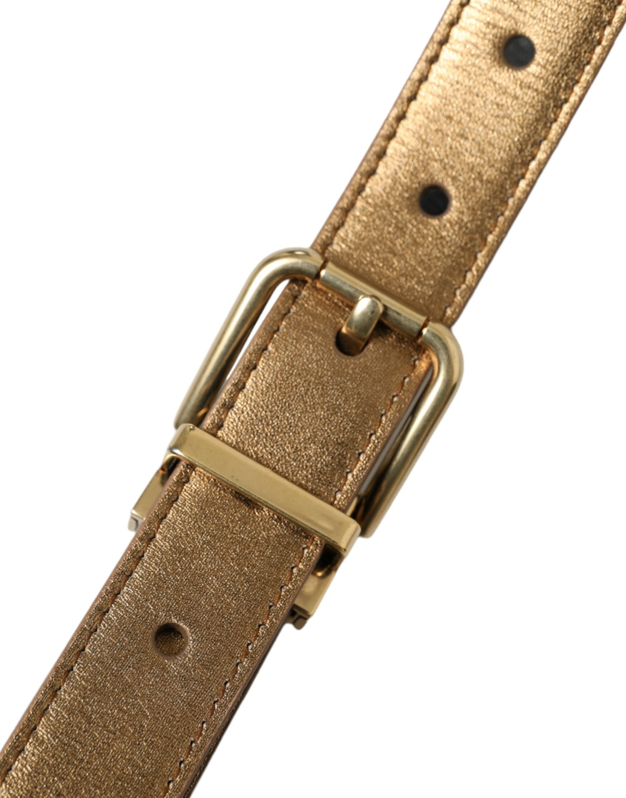Metallic gold calf leather belt with a metal buckle from Dolce & Gabbana, featuring a sleek and stylish design.