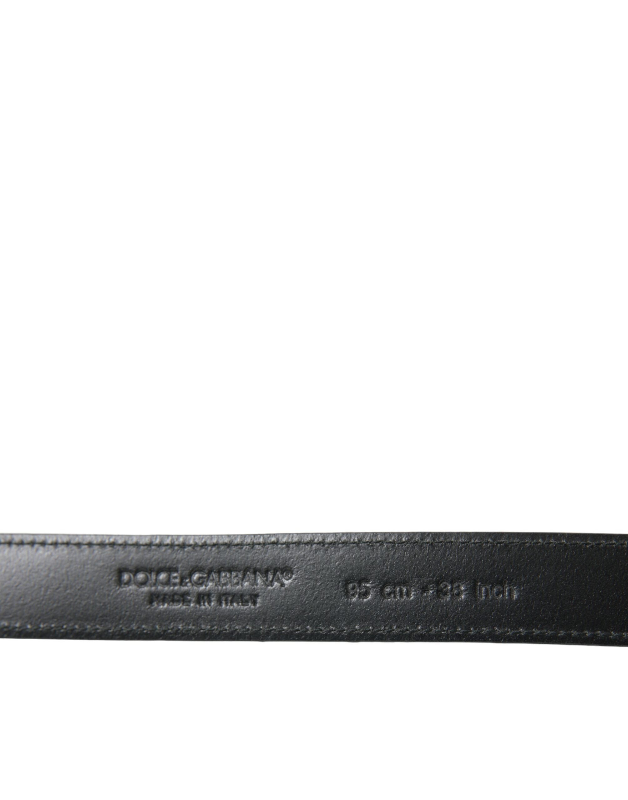 Black leather belt with silver metal buckle from Dolce & Gabbana, featuring a sleek, stylish design.