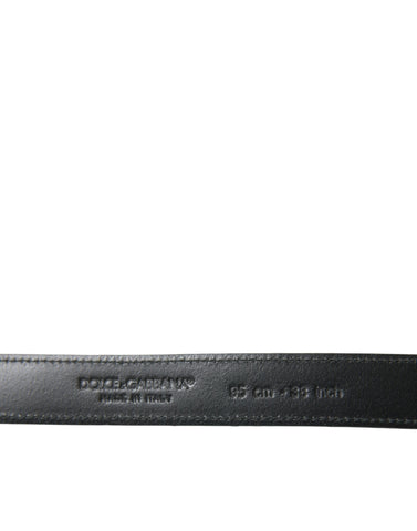 Black leather belt with silver metal buckle from Dolce & Gabbana, featuring a sleek, stylish design.