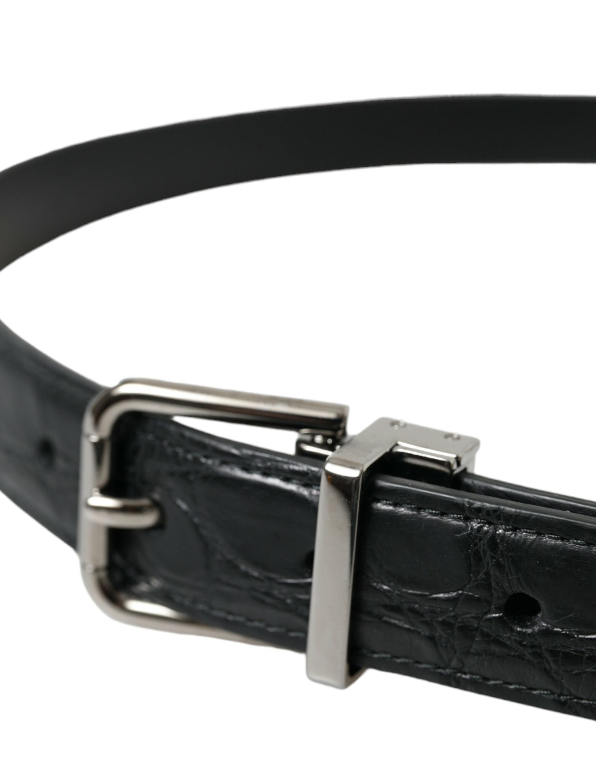 Black leather belt with silver metal buckle by Dolce & Gabbana, featuring a sleek design and adjustable strap.