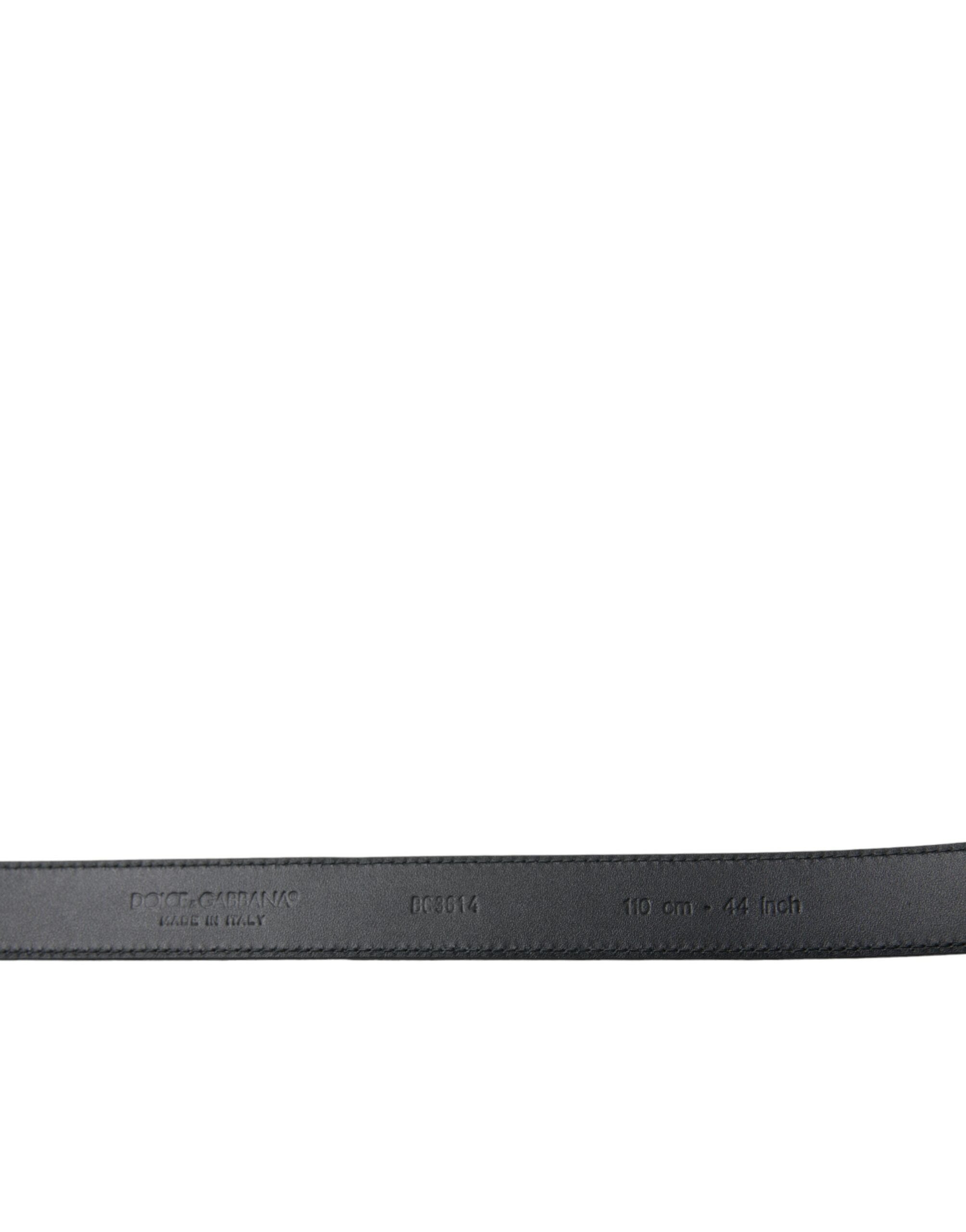 Black suede leather belt with gold metal buckle from Dolce & Gabbana, featuring a sleek, stylish design and adjustable fit.