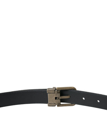 Black suede leather belt with gold metal buckle from Dolce & Gabbana, featuring a sleek, stylish design.