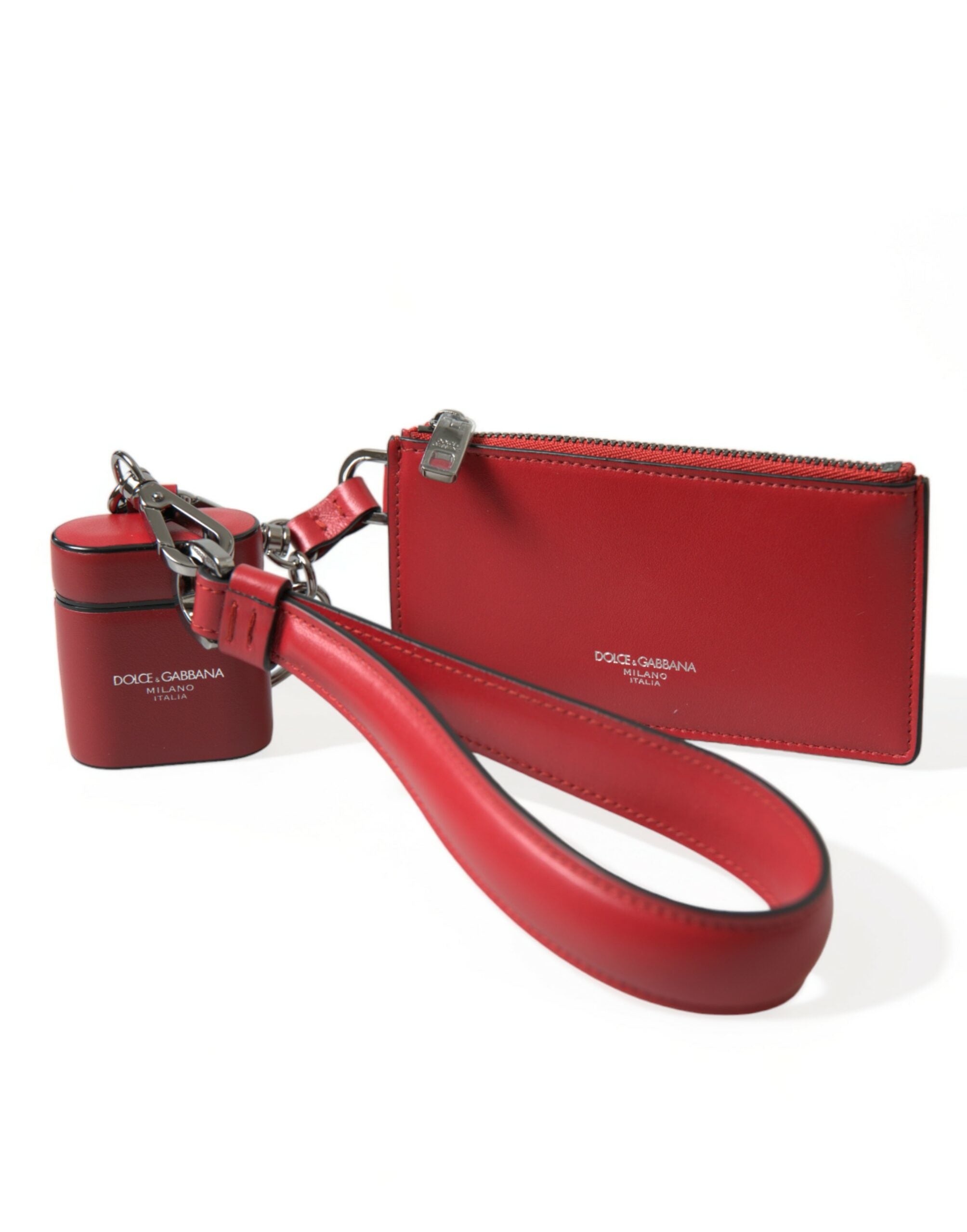 Red leather Airpods case with silver metal logo strap pouch by Dolce & Gabbana, featuring a sleek and stylish design.