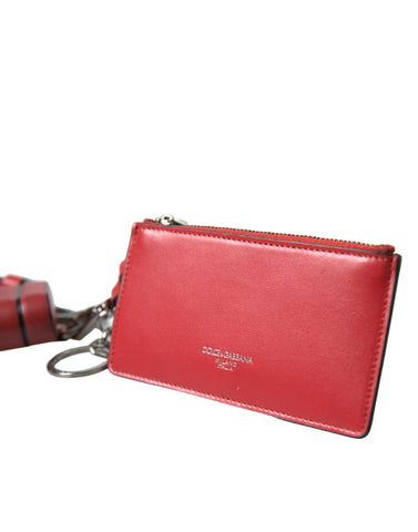 Red leather AirPods case with silver metal logo strap pouch by Dolce & Gabbana, featuring a sleek and stylish design.