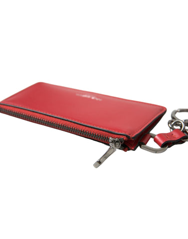 Red leather AirPods case with silver metal logo strap pouch by Dolce & Gabbana, featuring a sleek design and durable material.