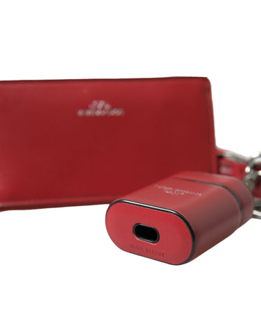 Red leather AirPods case with silver metal logo strap pouch by Dolce & Gabbana, featuring a sleek design and compact shape.