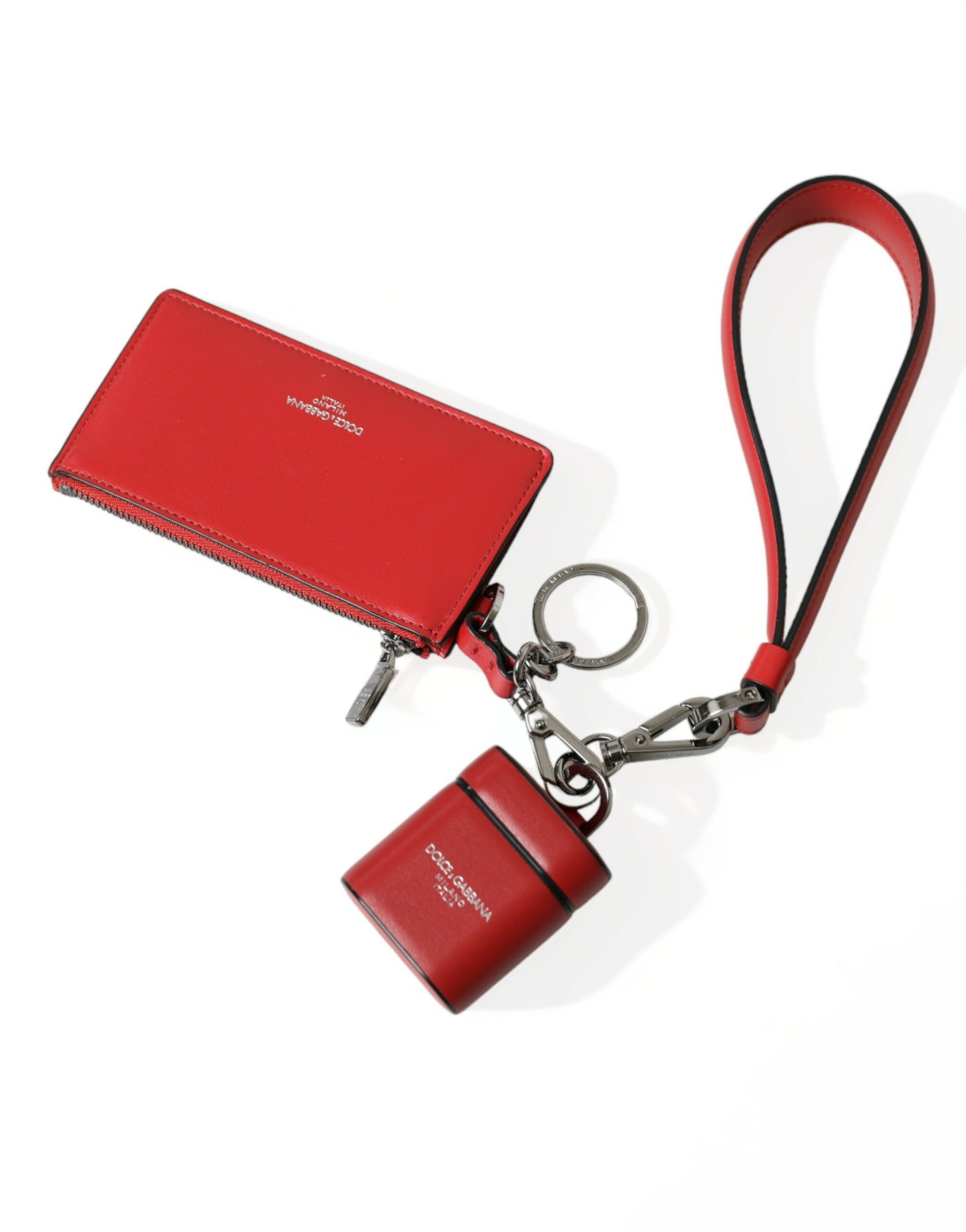 Red leather AirPods case with silver metal logo strap pouch by Dolce & Gabbana, featuring a sleek and stylish design.