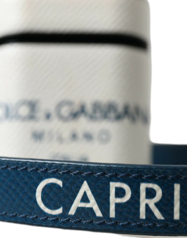 White and blue calf leather AirPods case with Dolce & Gabbana logo print strap, stylish and protective for wireless earbuds.