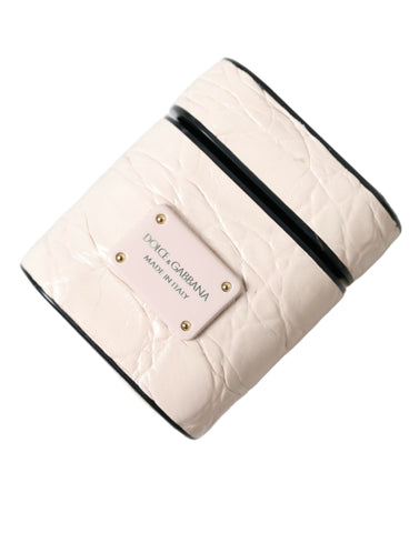 Light pink calf leather AirPods case with metal logo plaque by Dolce & Gabbana, showcasing a sleek, elegant design.