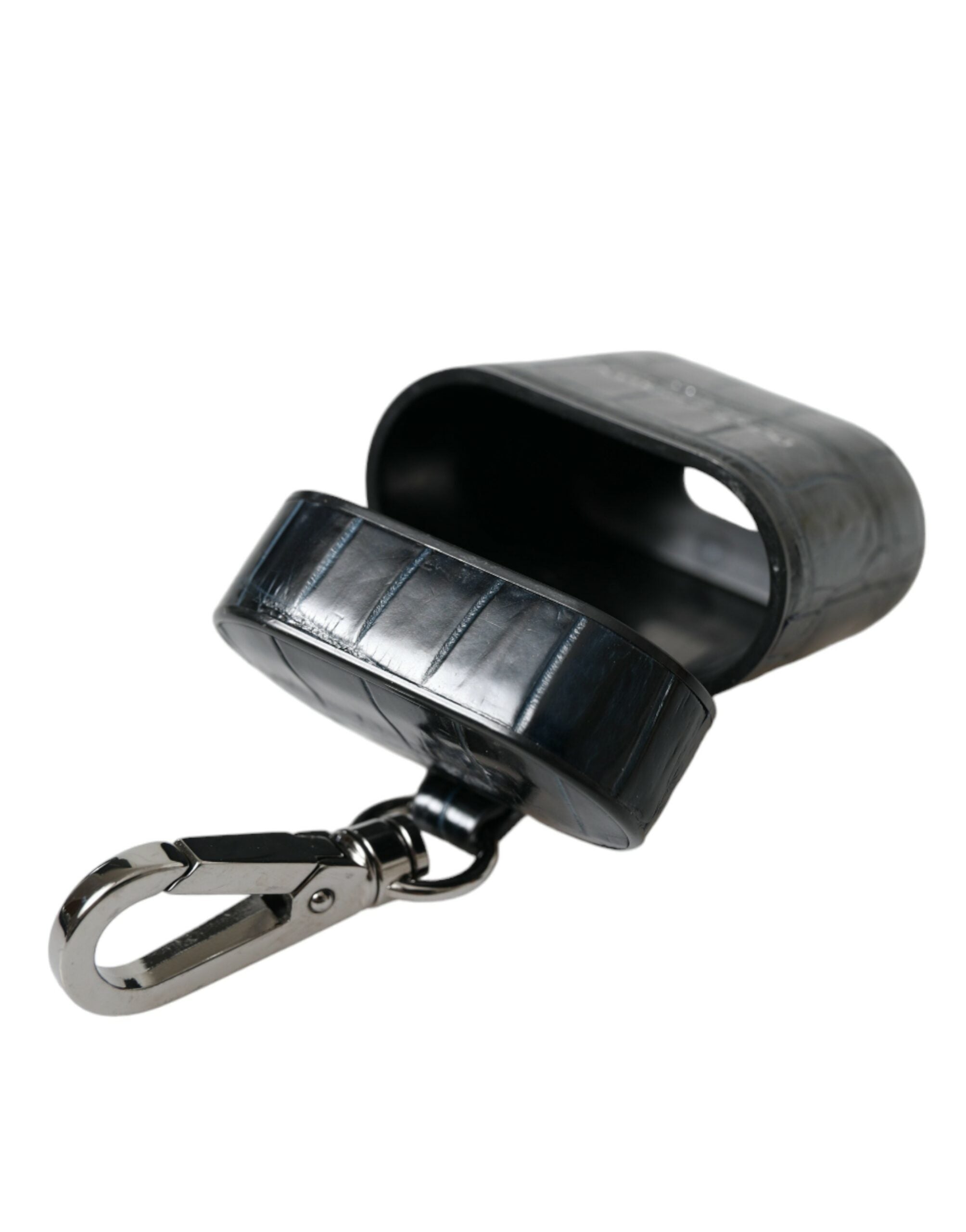 Black crocodile leather AirPods case with silver metal Dolce & Gabbana logo, designed to protect and stylishly house AirPods.