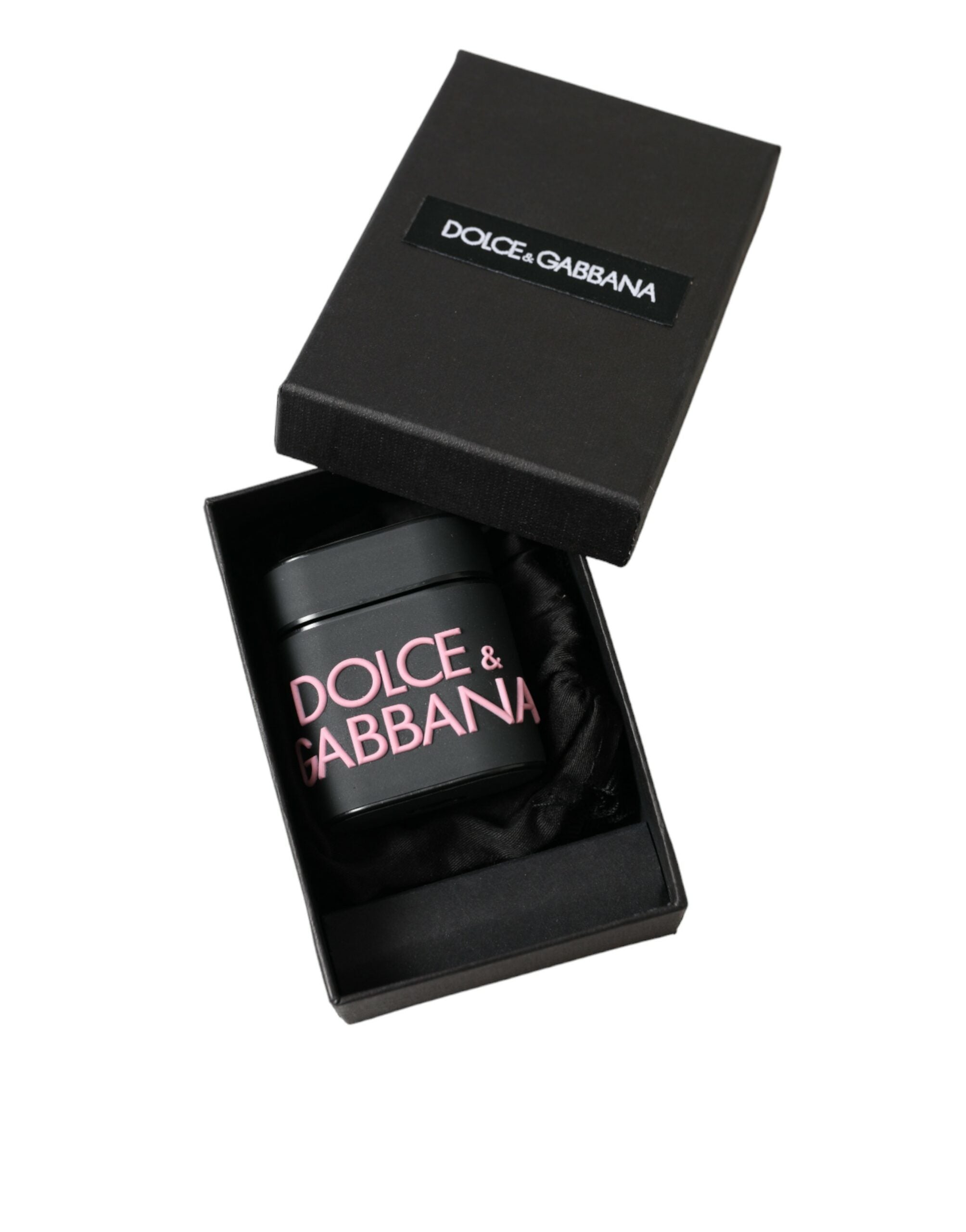 Black silicone AirPods case with embossed Dolce & Gabbana logo, featuring pink accents and a sleek, protective design.