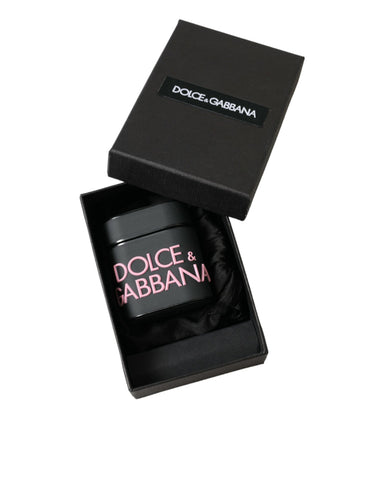 Black silicone AirPods case with embossed Dolce & Gabbana logo, featuring pink accents and a sleek, protective design.