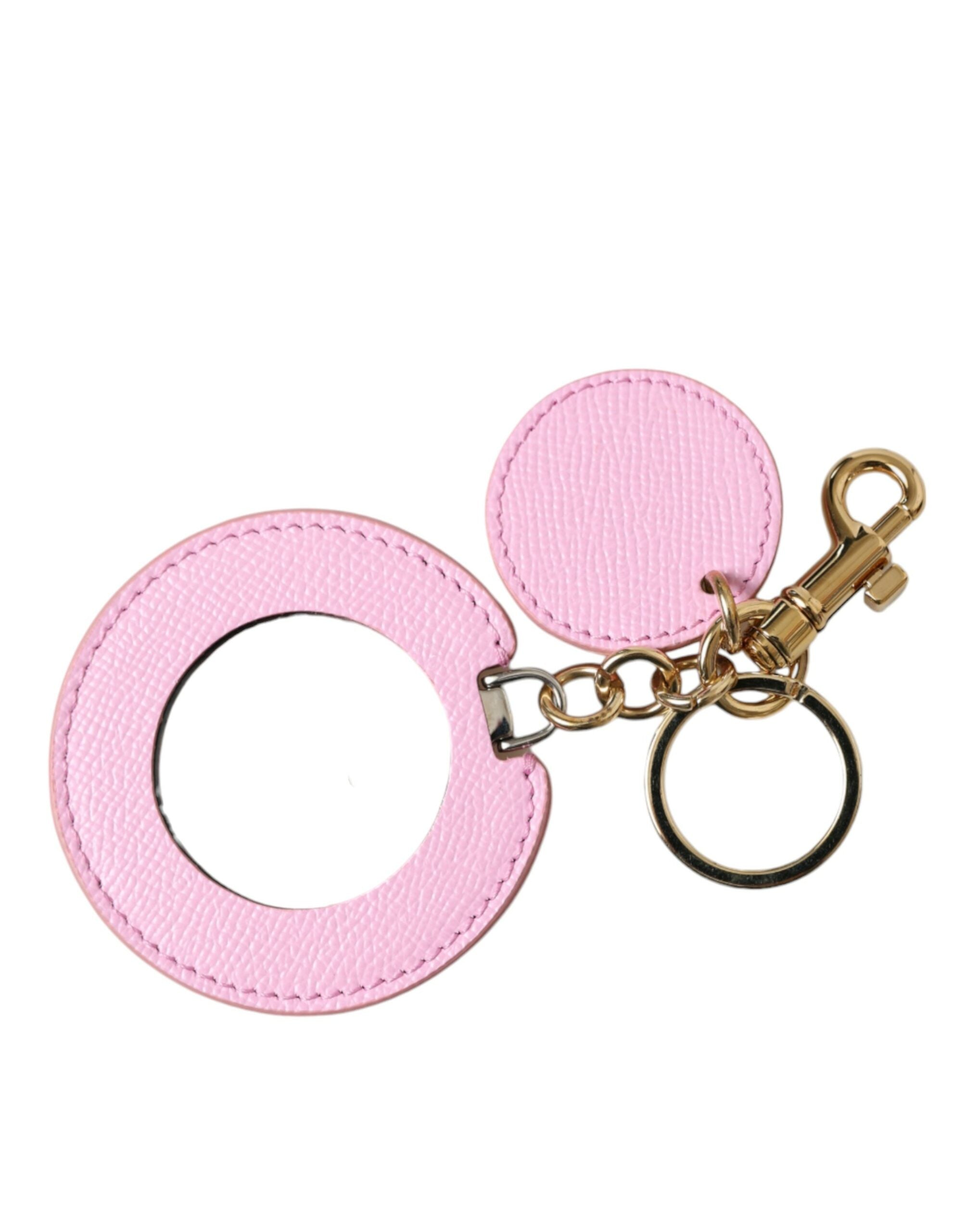 Pink calf leather Dolce & Gabbana keyring with gold metal logo print and attached keychain loop.