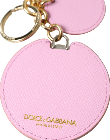Pink calf leather keyring with gold metal logo print, Dolce & Gabbana keychain accessory featuring a stylish design.