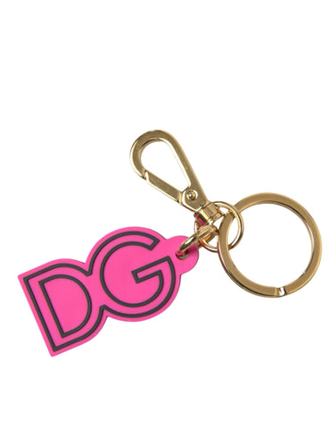 Pink rubber and gold-tone metal Dolce & Gabbana logo keyring with a stylish keychain design.