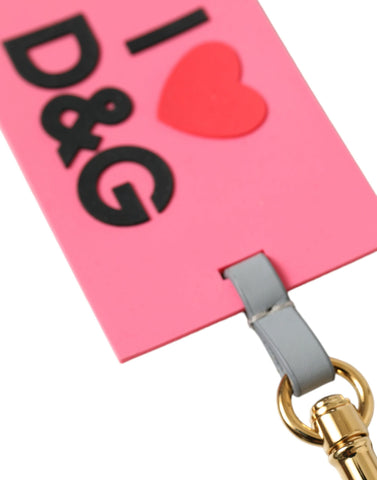 Pink silicone Dolce & Gabbana logo gold brass keychain with branded DG emblem and keyring attachment.