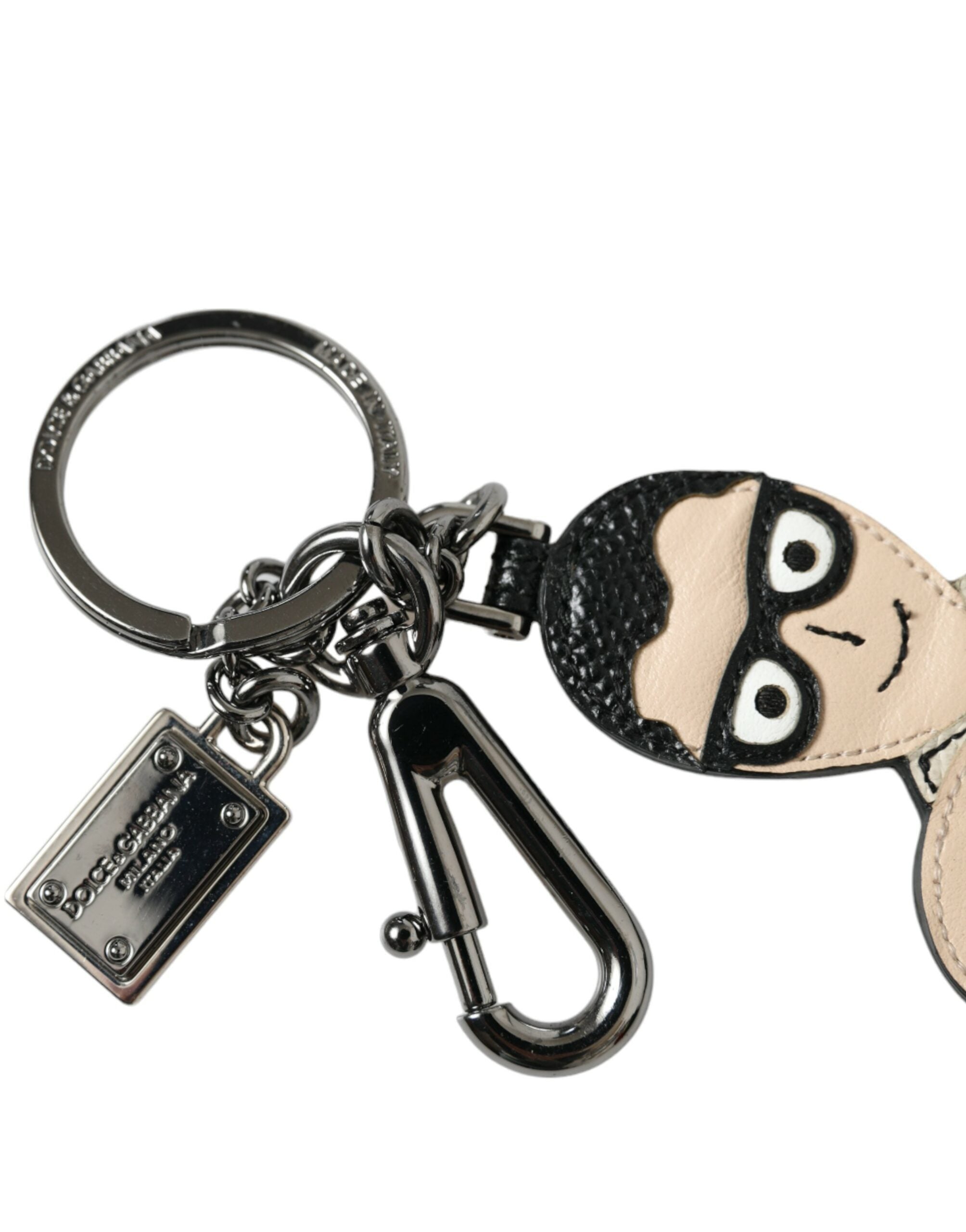 Leather keychain with Dolce & Gabbana Dominico Stefano #DGFAMILY logo badge, featuring a sleek black leather design.