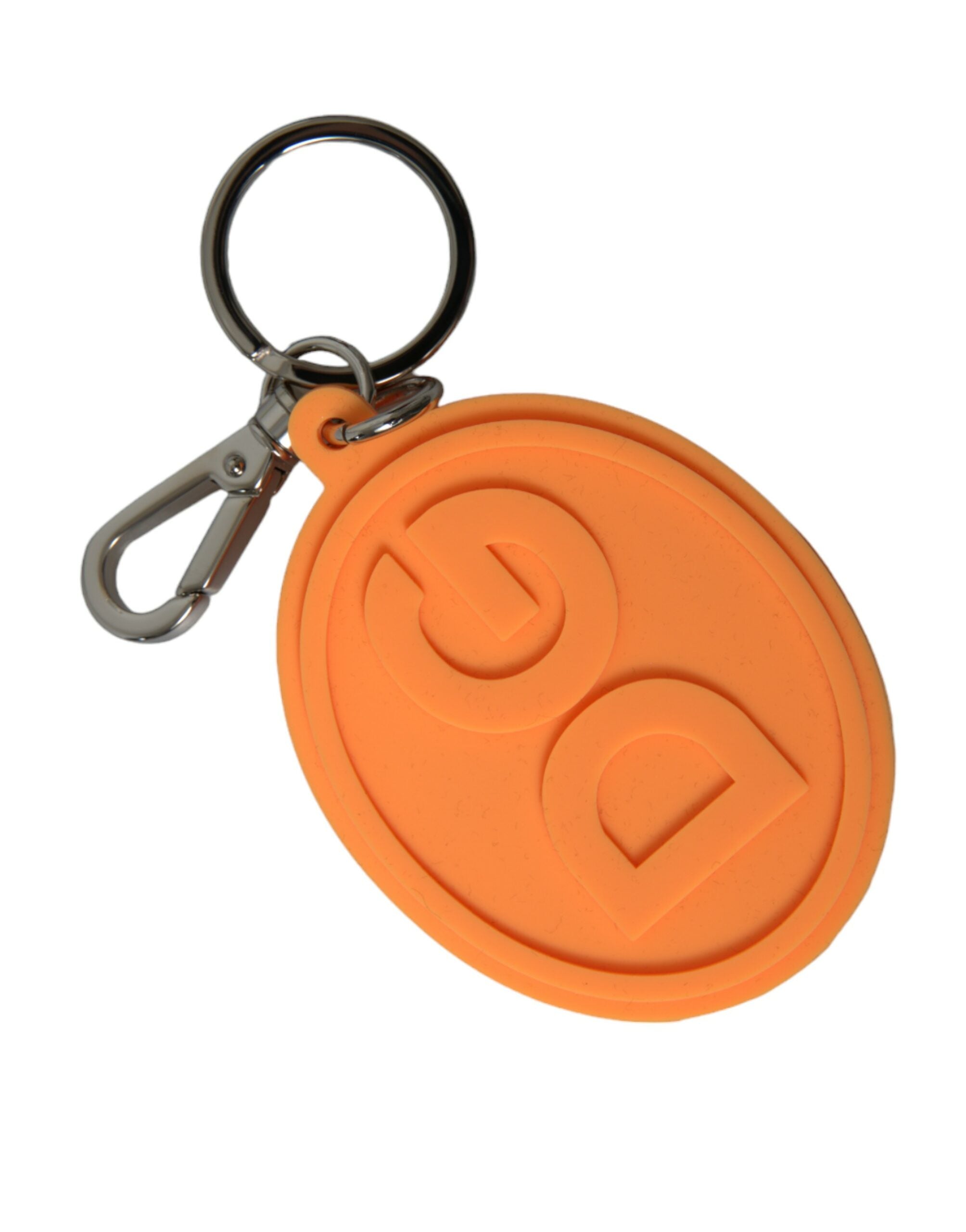 Orange rubber Dolce & Gabbana keyring with silver brass DG logo and metal keychain attachment.