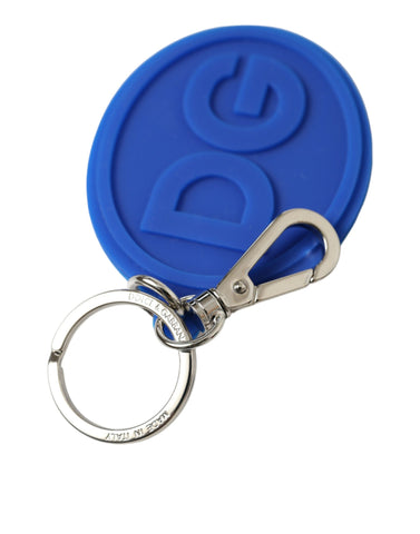 Blue rubber Dolce & Gabbana keyring with silver brass DG logo, featuring a metal keychain design.