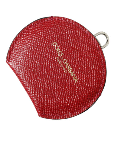 Red calfskin leather Dolce & Gabbana round logo hand mirror holder with sleek design and embossed branding.