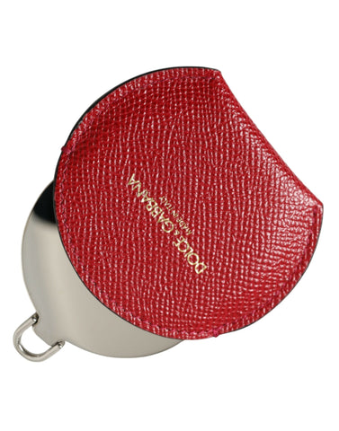 Red calfskin leather Dolce & Gabbana round logo hand mirror holder with sleek design and gold-tone logo detail.