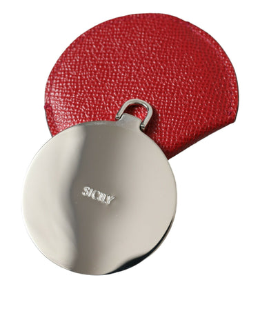 Red calfskin leather Dolce & Gabbana round logo hand mirror holder with sleek, compact design and embossed branding.
