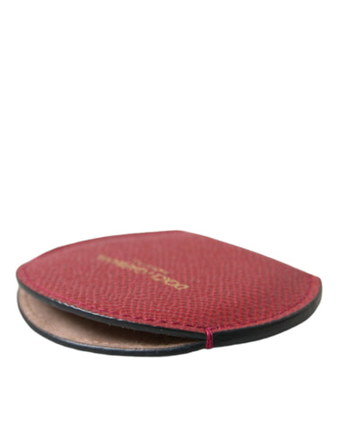 Red calfskin leather Dolce & Gabbana round logo hand mirror holder with sleek design and embossed logo detail.