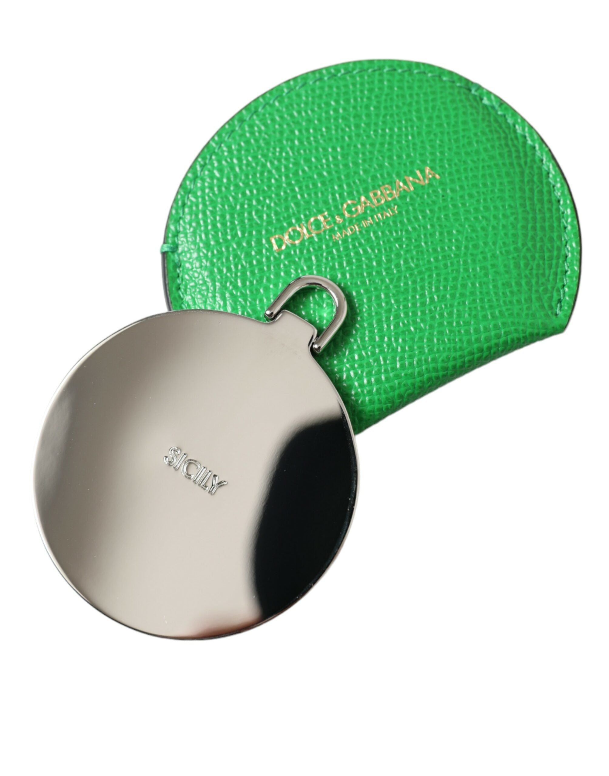 Green calfskin leather round logo hand mirror holder by Dolce & Gabbana, showing the textured leather and elegant logo embossing.