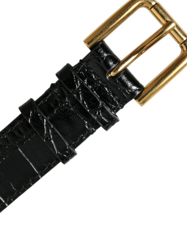 Black textured leather armband by Dolce & Gabbana with a gold-tone metal buckle, stylish accessory for fashionable wrists.