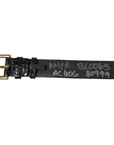 Black textured leather armband by Dolce & Gabbana with a gold-tone metal buckle, stylish and modern accessory.