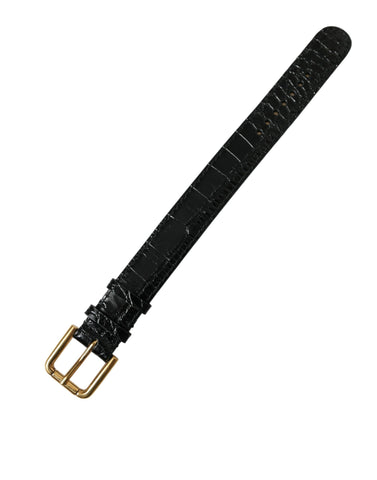 Black textured leather armband with gold-tone metal buckle by Dolce & Gabbana, stylish accessory with detailed craftsmanship.
