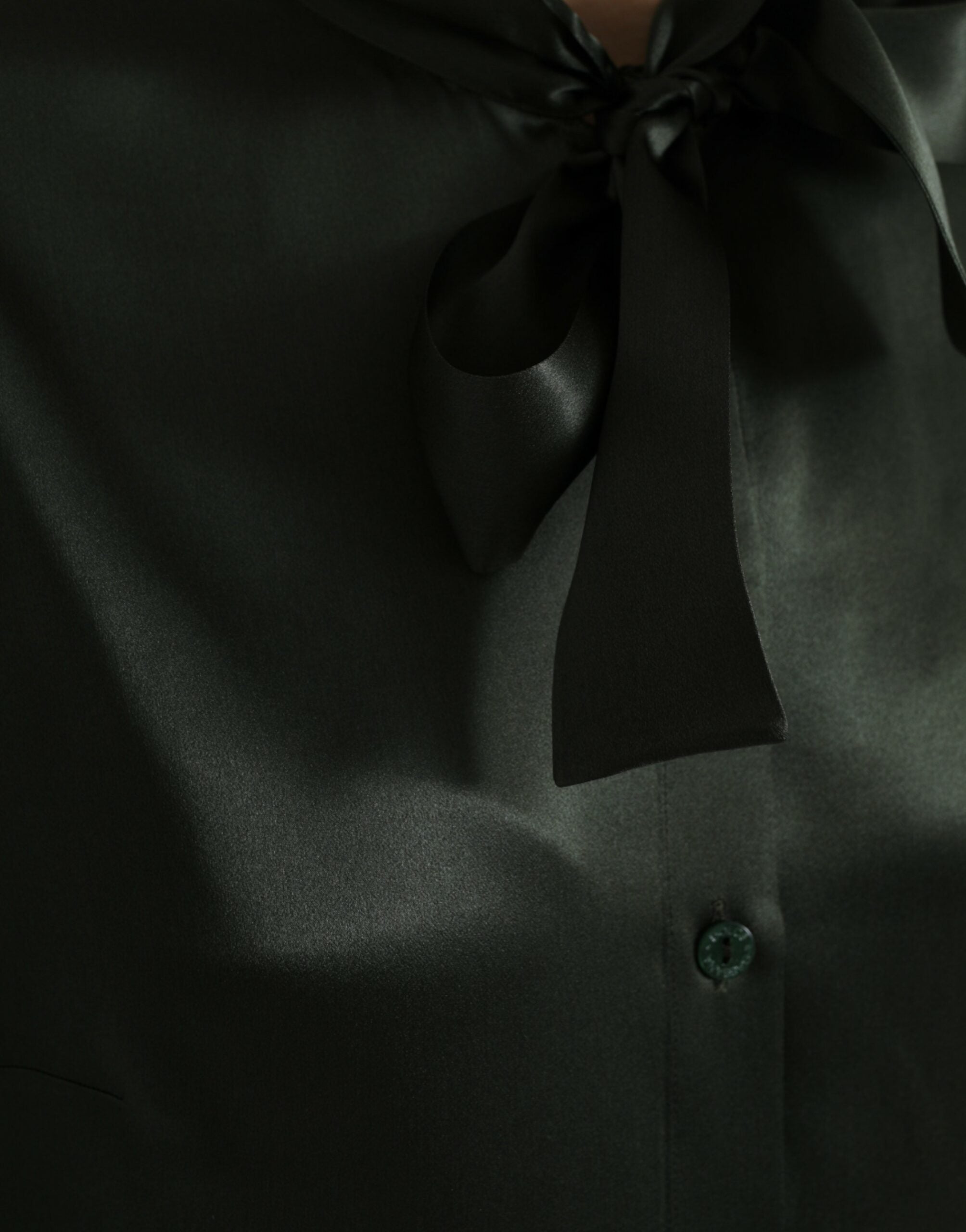 Gray long-sleeve blouse with ascot collar by Dolce & Gabbana, featuring a stylish, elegant design and tailored fit.