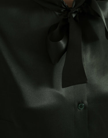 Gray long-sleeve blouse with ascot collar by Dolce & Gabbana, featuring a stylish, elegant design and tailored fit.