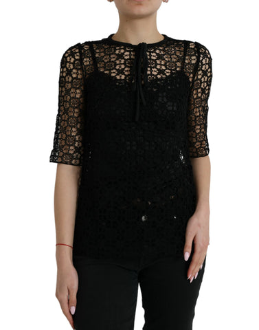 Black floral lace short sleeve blouse top by Dolce & Gabbana, featuring intricate lace details and a elegant fit.