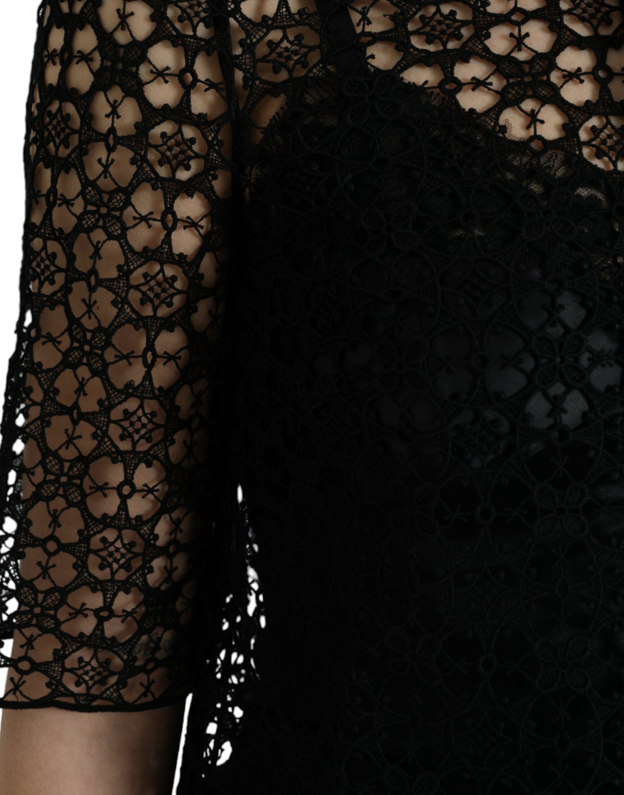 Black floral lace short sleeve blouse top by Dolce & Gabbana with intricate lace details and a elegant fit.