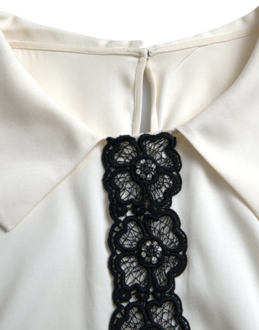 Dolce & Gabbana off-white silk short sleeve top with lace trim, stylish and elegant fashion piece.