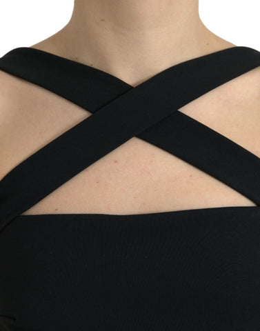 Black sheath halter sleeveless midi dress by Dolce & Gabbana, shown on a mannequin, highlighting fitted silhouette and elegant design.