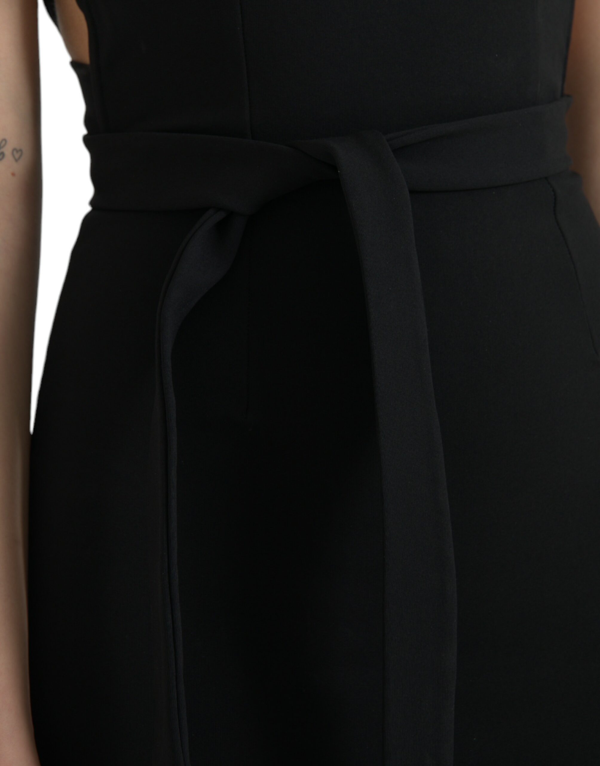 Black sheath halter sleeveless midi dress by Dolce & Gabbana, shown on a model, with a close-up of the dress's elegant fabric.