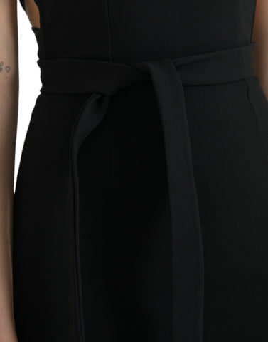 Black sheath halter sleeveless midi dress by Dolce & Gabbana, shown on a model, with a close-up of the dress's elegant fabric.